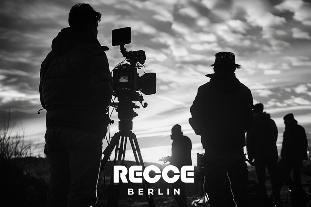 A high-quality wide image showing an outdoor shoot with backlight or golden hour lighting.