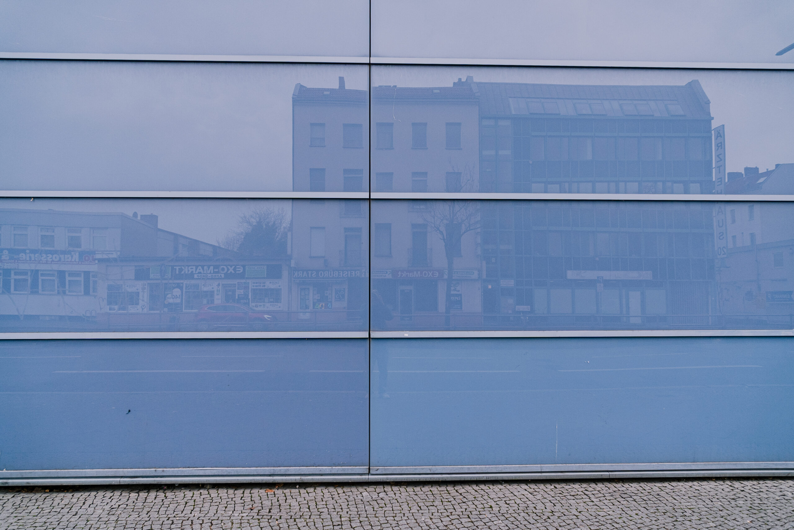 345. Blue Mirrored Facade